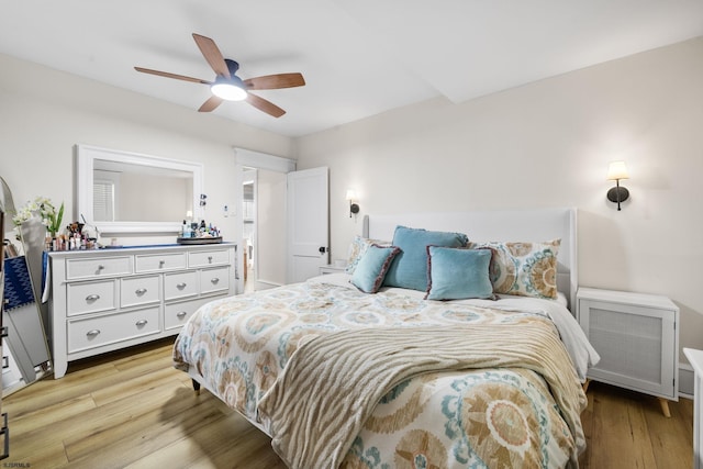 bedroom featuring light wood-type flooring and ceiling fan