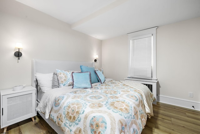 bedroom featuring dark hardwood / wood-style floors