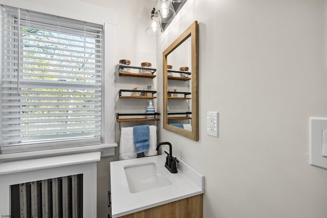 bathroom with vanity and a healthy amount of sunlight