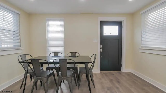 dining area featuring hardwood / wood-style flooring