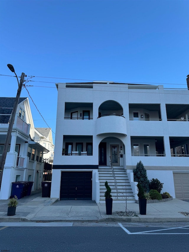 view of front of property featuring a garage