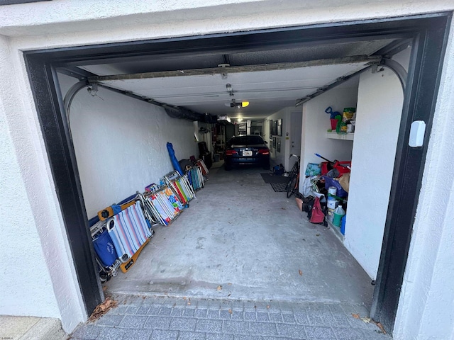 garage featuring a garage door opener