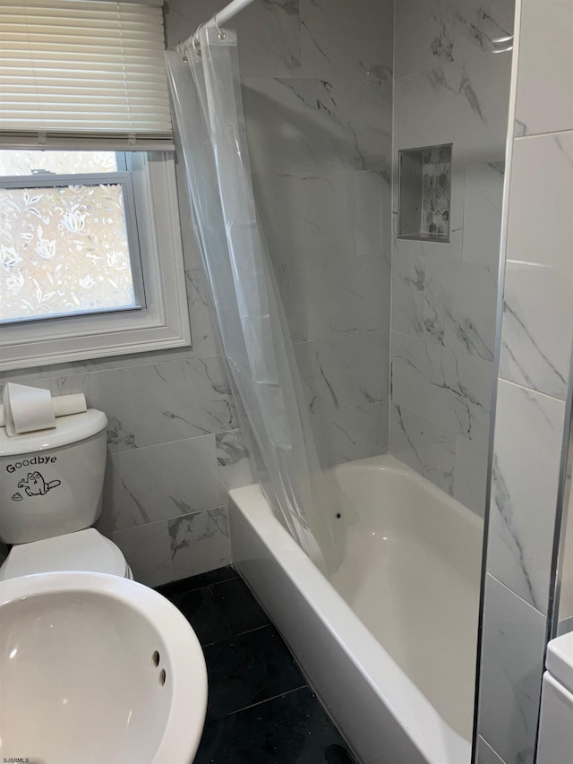 bathroom featuring sink, shower / bath combination with curtain, and tile patterned flooring