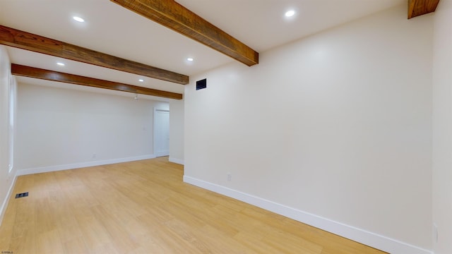 basement featuring light hardwood / wood-style floors