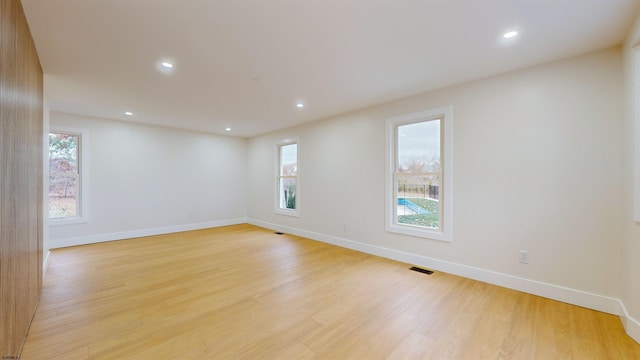 empty room featuring light hardwood / wood-style floors