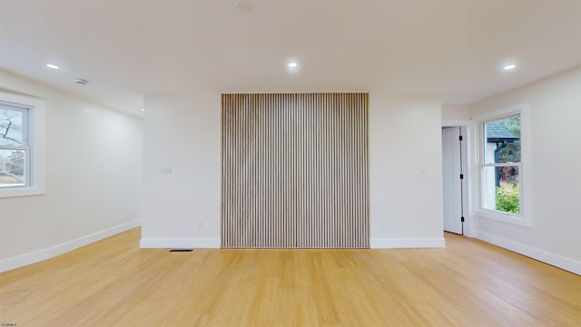 unfurnished bedroom with light wood-type flooring