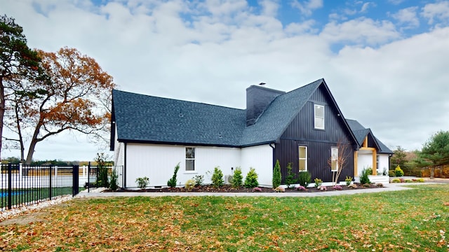 view of home's exterior featuring a yard