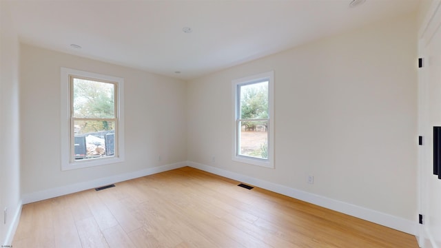 empty room featuring light hardwood / wood-style floors