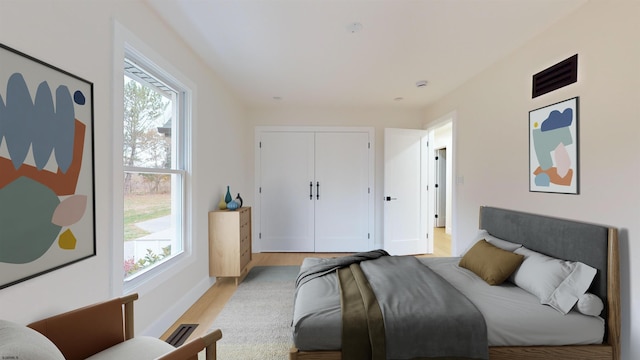 bedroom featuring light hardwood / wood-style floors