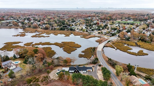 drone / aerial view with a water view