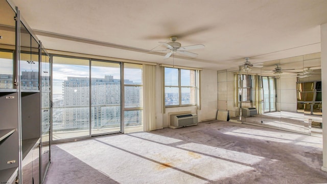 interior space with ceiling fan