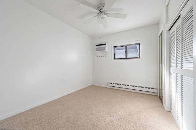 unfurnished bedroom featuring light carpet, an AC wall unit, ceiling fan, and a baseboard heating unit