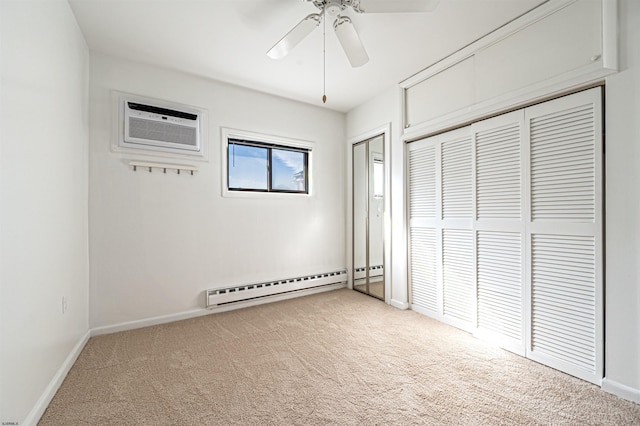 unfurnished bedroom featuring light carpet, ceiling fan, baseboard heating, a wall unit AC, and a closet