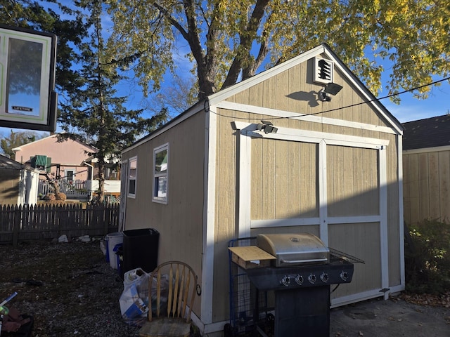 exterior space featuring a storage shed