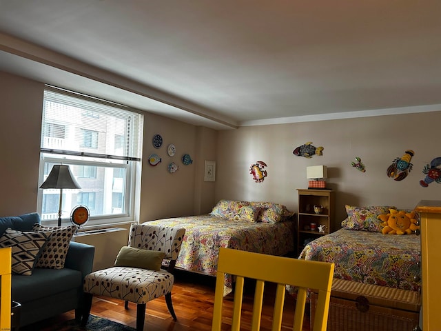 bedroom with hardwood / wood-style floors