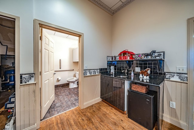 kitchen featuring hardwood / wood-style flooring and sink