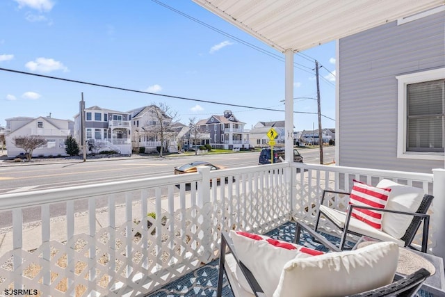 balcony featuring covered porch