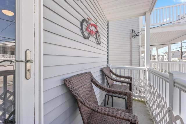 balcony featuring a porch