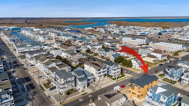 drone / aerial view featuring a water view