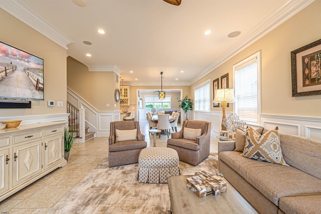 living room with ornamental molding