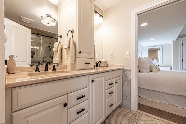 bathroom featuring vanity, hardwood / wood-style flooring, and a shower with shower door