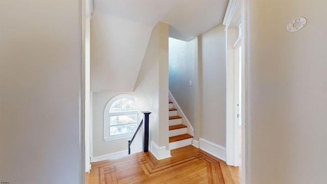 stairway with parquet floors