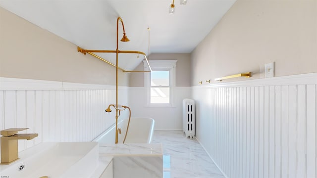 bathroom with radiator heating unit