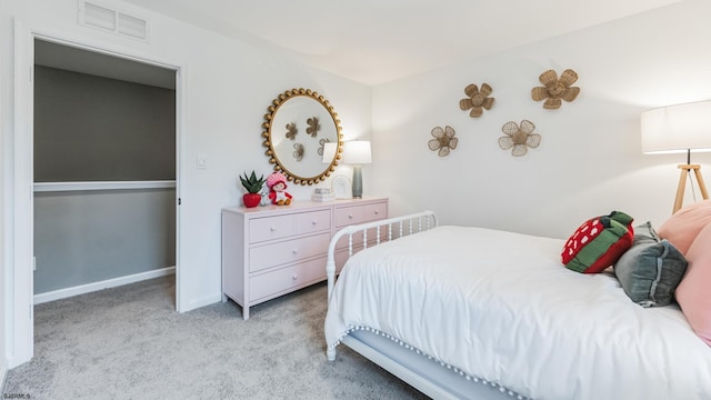 bedroom featuring light colored carpet