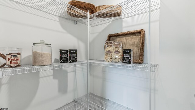 spacious closet with tile patterned floors