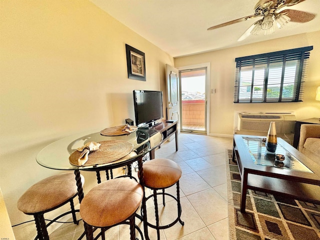 tiled living room featuring ceiling fan