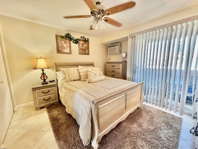 bedroom featuring ceiling fan, light tile patterned floors, and a wall unit AC