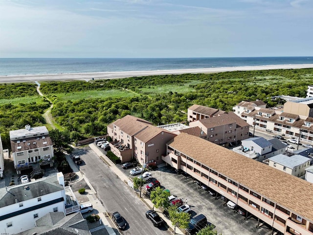 bird's eye view with a beach view and a water view