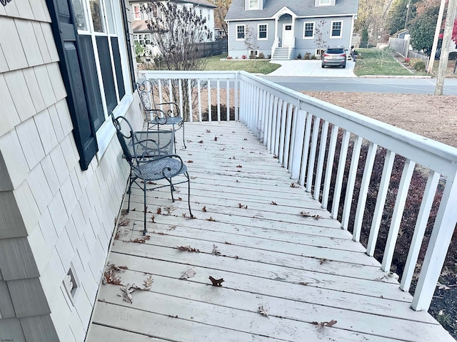 wooden deck featuring covered porch