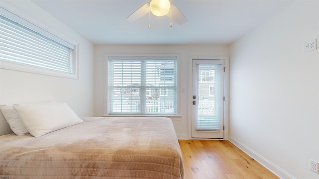 unfurnished bedroom featuring ceiling fan and light hardwood / wood-style floors