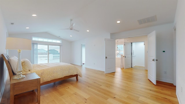 bedroom with multiple windows, light hardwood / wood-style floors, vaulted ceiling, and ceiling fan