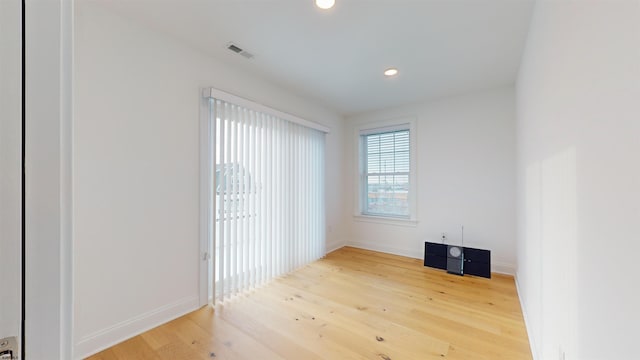 empty room featuring wood-type flooring