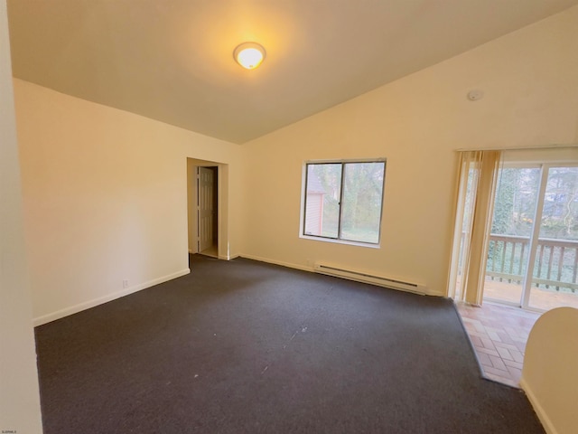 empty room featuring a baseboard radiator, vaulted ceiling, and dark carpet