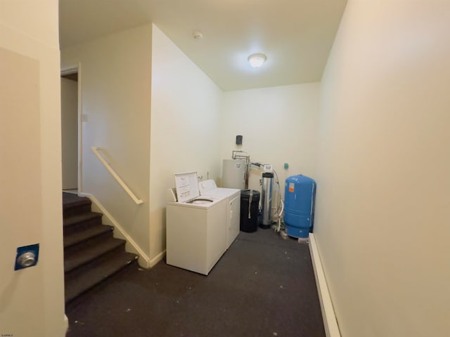 clothes washing area featuring washing machine and clothes dryer