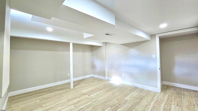 basement with light wood-type flooring