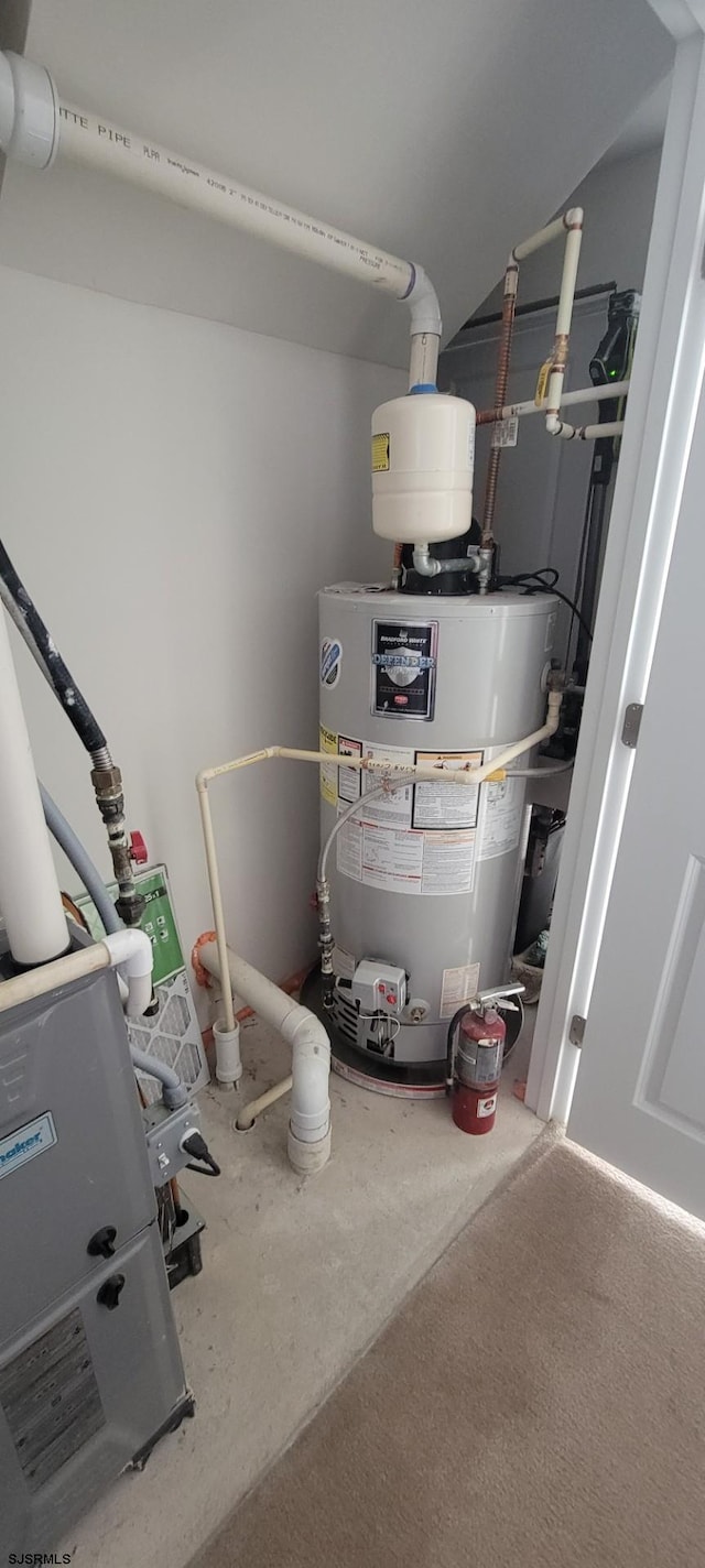 utility room with water heater