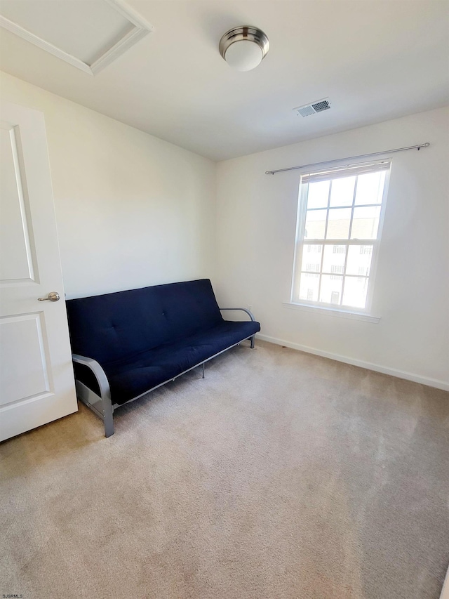 unfurnished room featuring light colored carpet