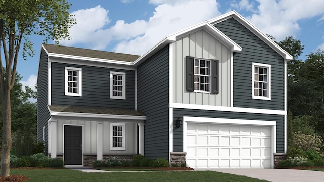 view of front of home with a front lawn and a garage