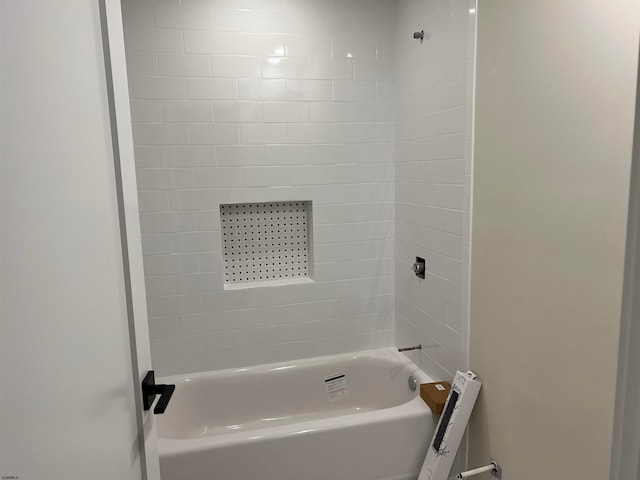 bathroom with shower / bathing tub combination