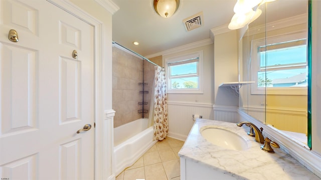 bathroom with tile patterned floors, crown molding, vanity, and shower / bath combination with curtain