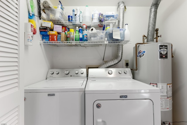 washroom with separate washer and dryer and water heater