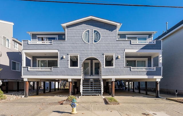 coastal inspired home featuring a carport