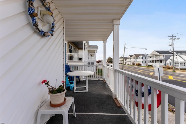 balcony featuring a porch