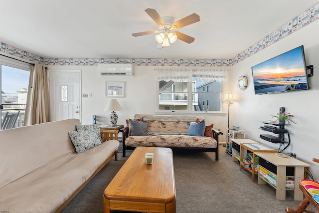 living room featuring ceiling fan, plenty of natural light, dark carpet, and a wall unit AC