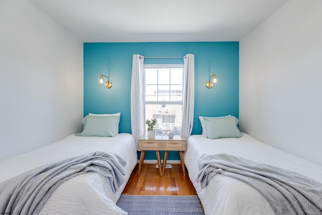 bedroom with wood-type flooring