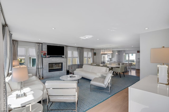 living room with light hardwood / wood-style floors